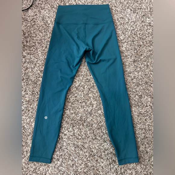 Lululemon Wunder Train High-Rise Tight 25"
Storm Teal Sz 6 - Picture 10 of 12